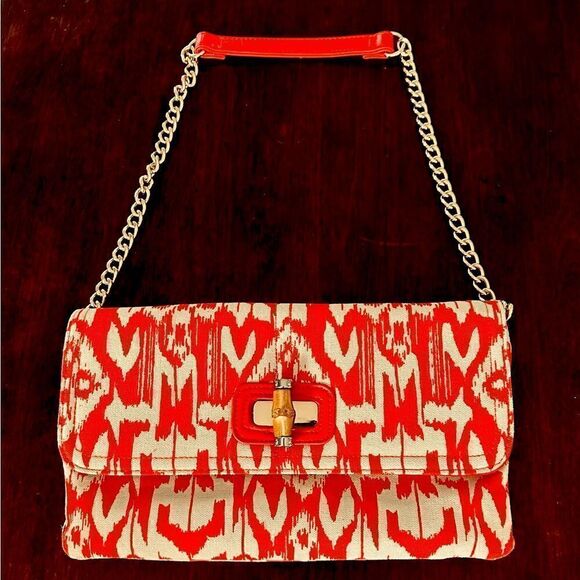 Chico’s coral and white canvas clutch bag with gold chain strap. - Picture 1 of 6